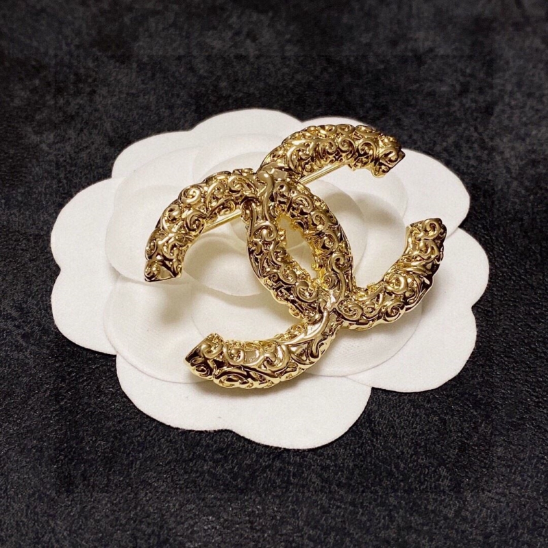 Ch*el brooches